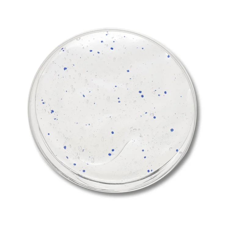 clear serum product swatch with blue specks